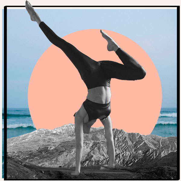Woman performing a yoga post on a mountain scape with crashing waves in the background